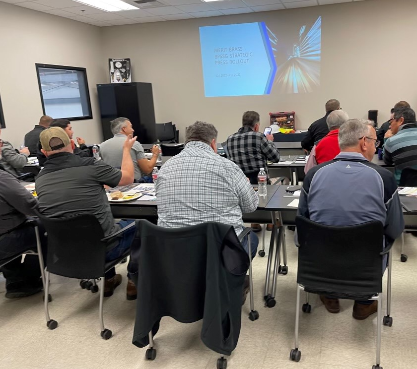 Merit Brass Training a Group of People